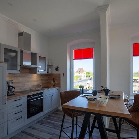 Heimathafen Ueber Hafen-Pub Apartment Pellworm Bagian luar foto