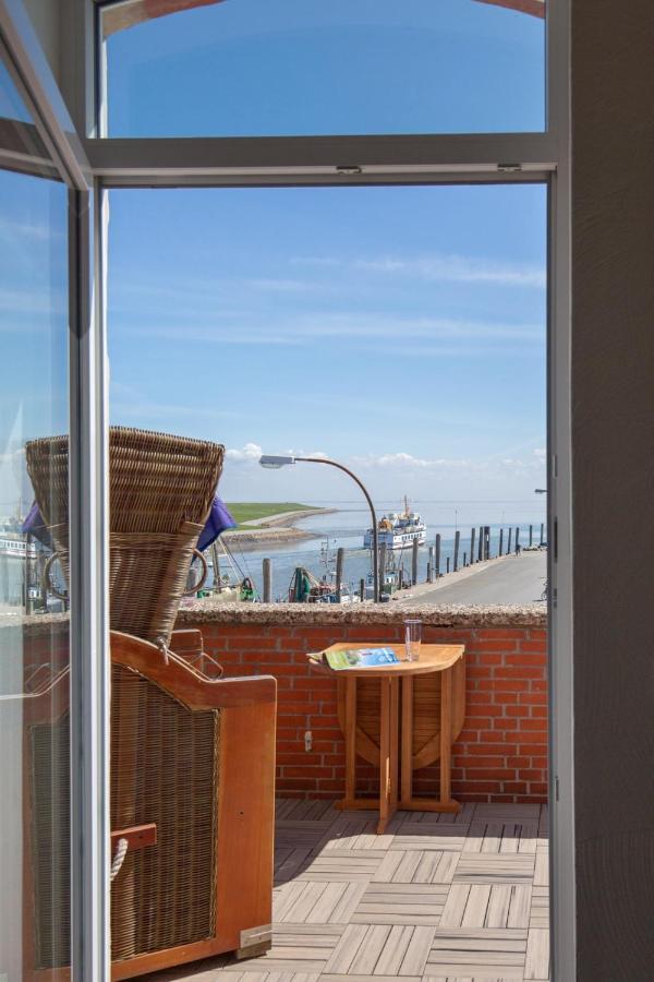 Heimathafen Ueber Hafen-Pub Apartment Pellworm Bagian luar foto